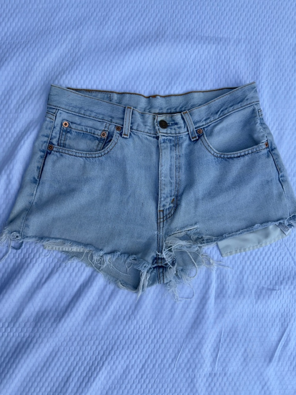 VINTAGE Levi's Light Blue Denim Short Distressed Hem